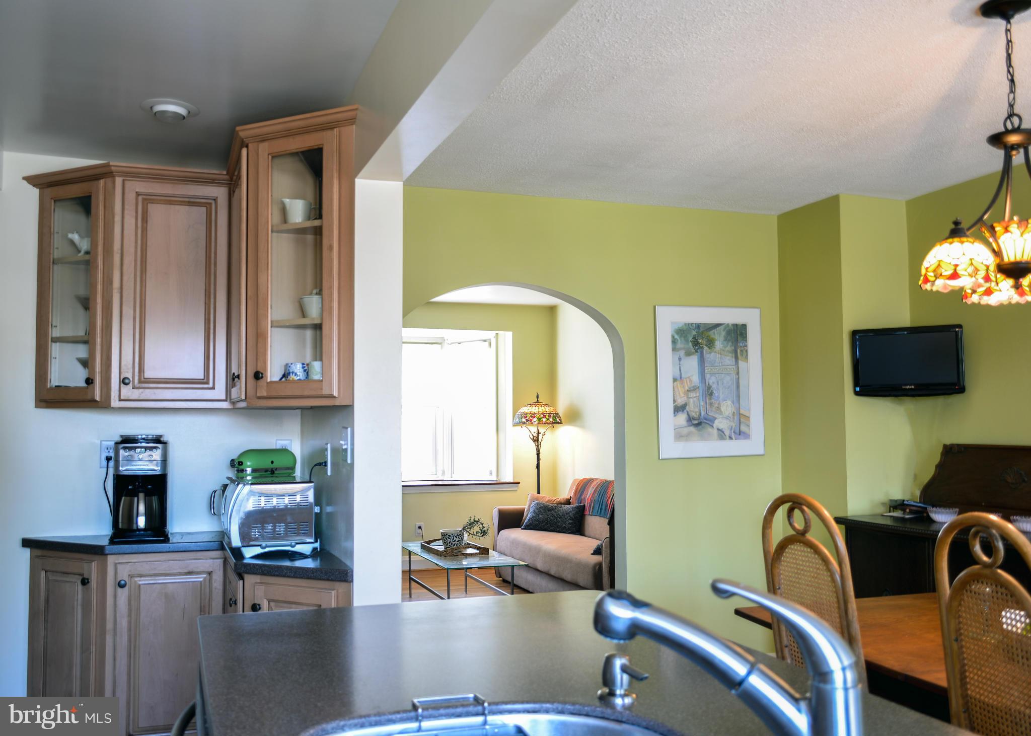 1604 Loch Ness Road Baltimore, MD 21286 - Photo 5 of 26 a kitchen with stainless steel appliances granite countertop a sink and cabinets