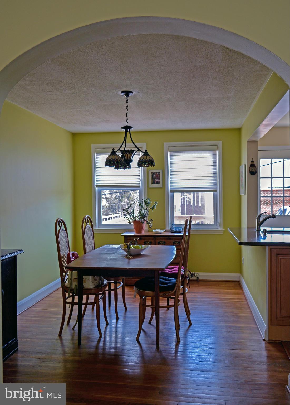 1604 Loch Ness Road Baltimore, MD 21286 - Photo 9 of 26 a view of a dining room with furniture window and wooden floor