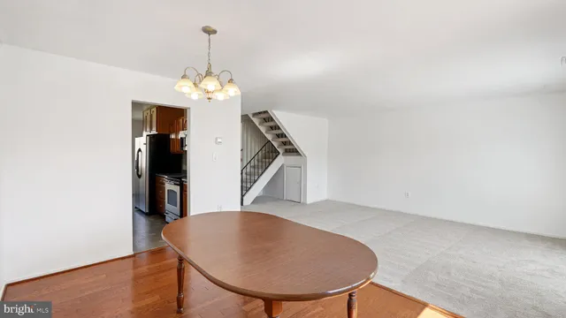 a view of a livingroom with furniture and wooden floor