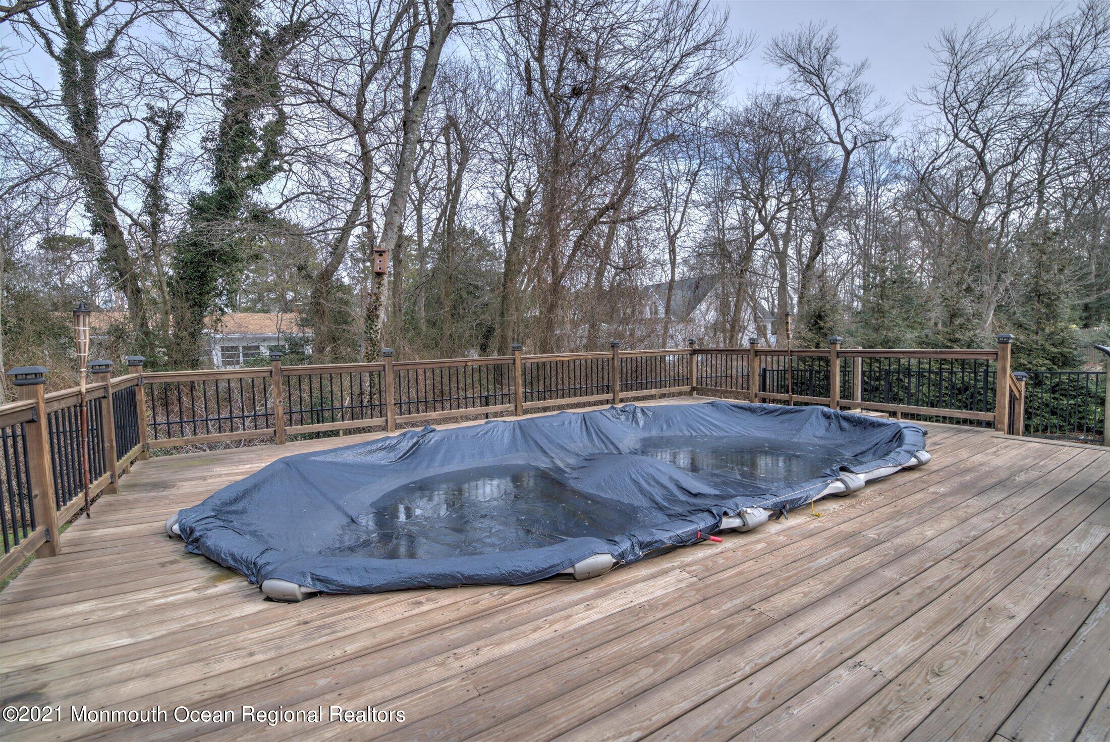 412 Conifer Drive Forked River, NJ 08731 - Photo 29 of 37 a view of wooden floor with a dry yard