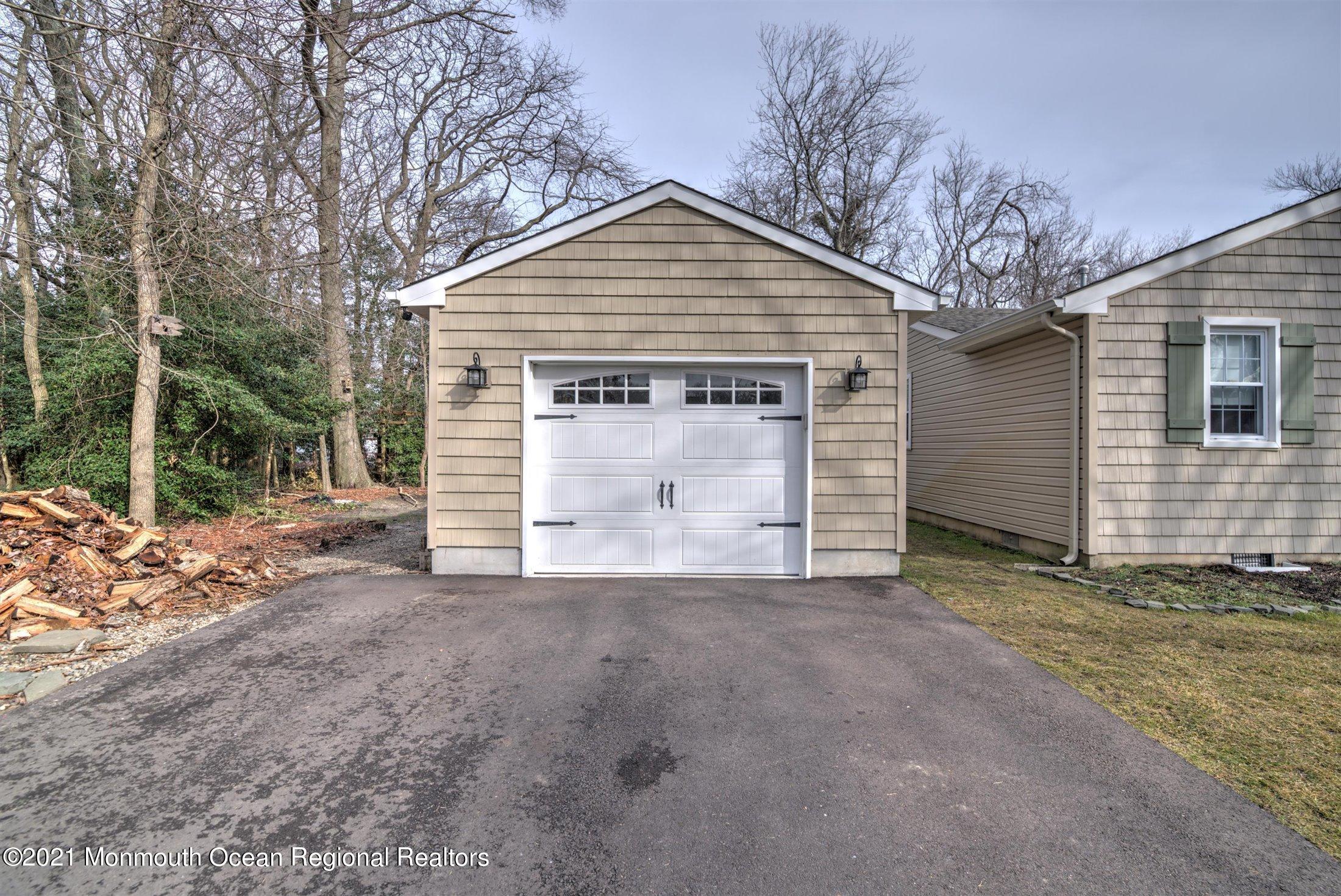 412 Conifer Drive Forked River, NJ 08731 - Photo 33 of 37 a view of a house with a yard