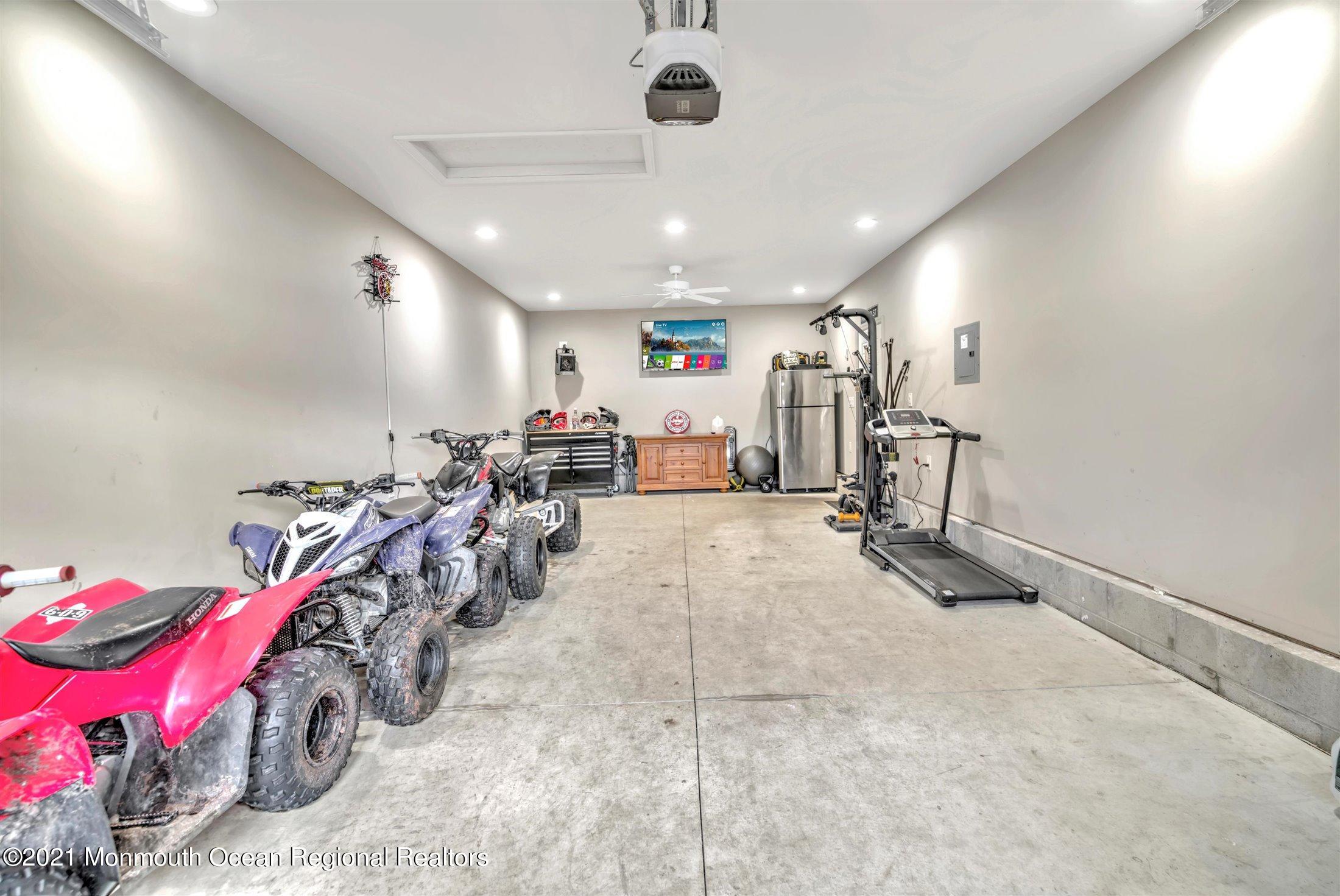 412 Conifer Drive Forked River, NJ 08731 - Photo 34 of 37 a view of a room with gym equipment