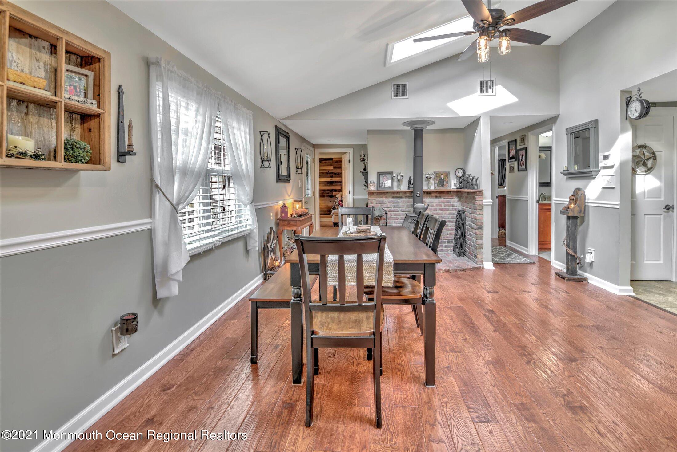 412 Conifer Drive Forked River, NJ 08731 - Photo 5 of 37 a view of a livingroom and dining room