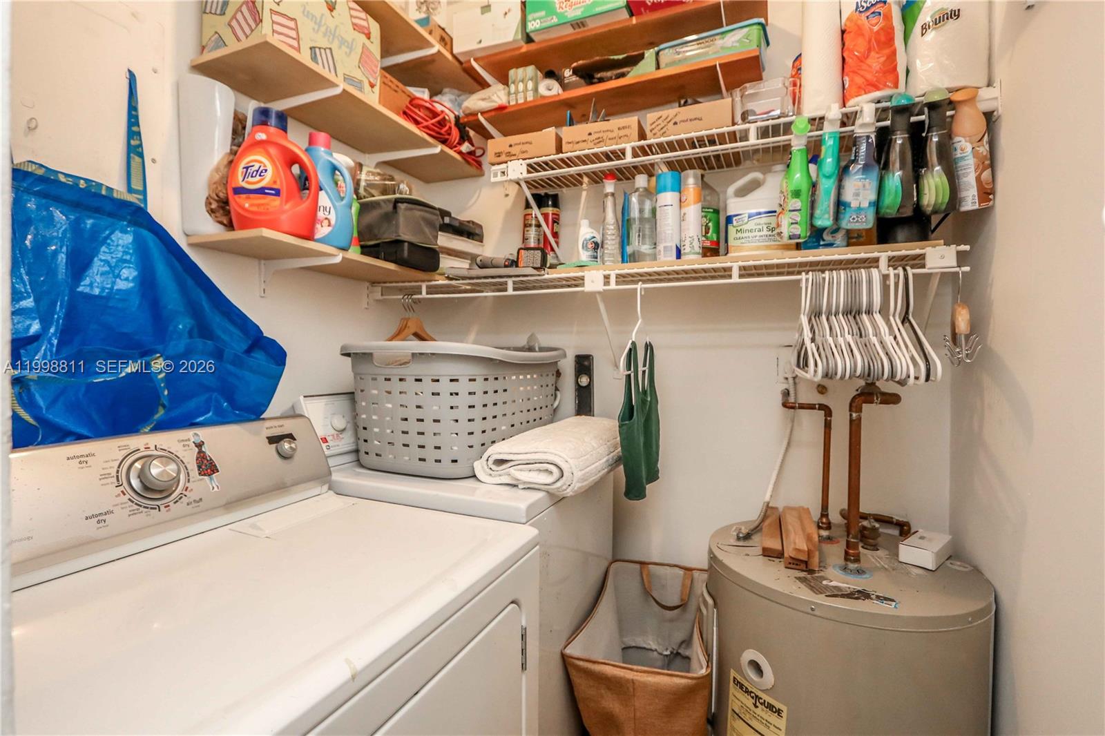 3155 Jackson Avenue Miami, FL 33133 - Photo 17 of 20 a utility room with dryer and washer