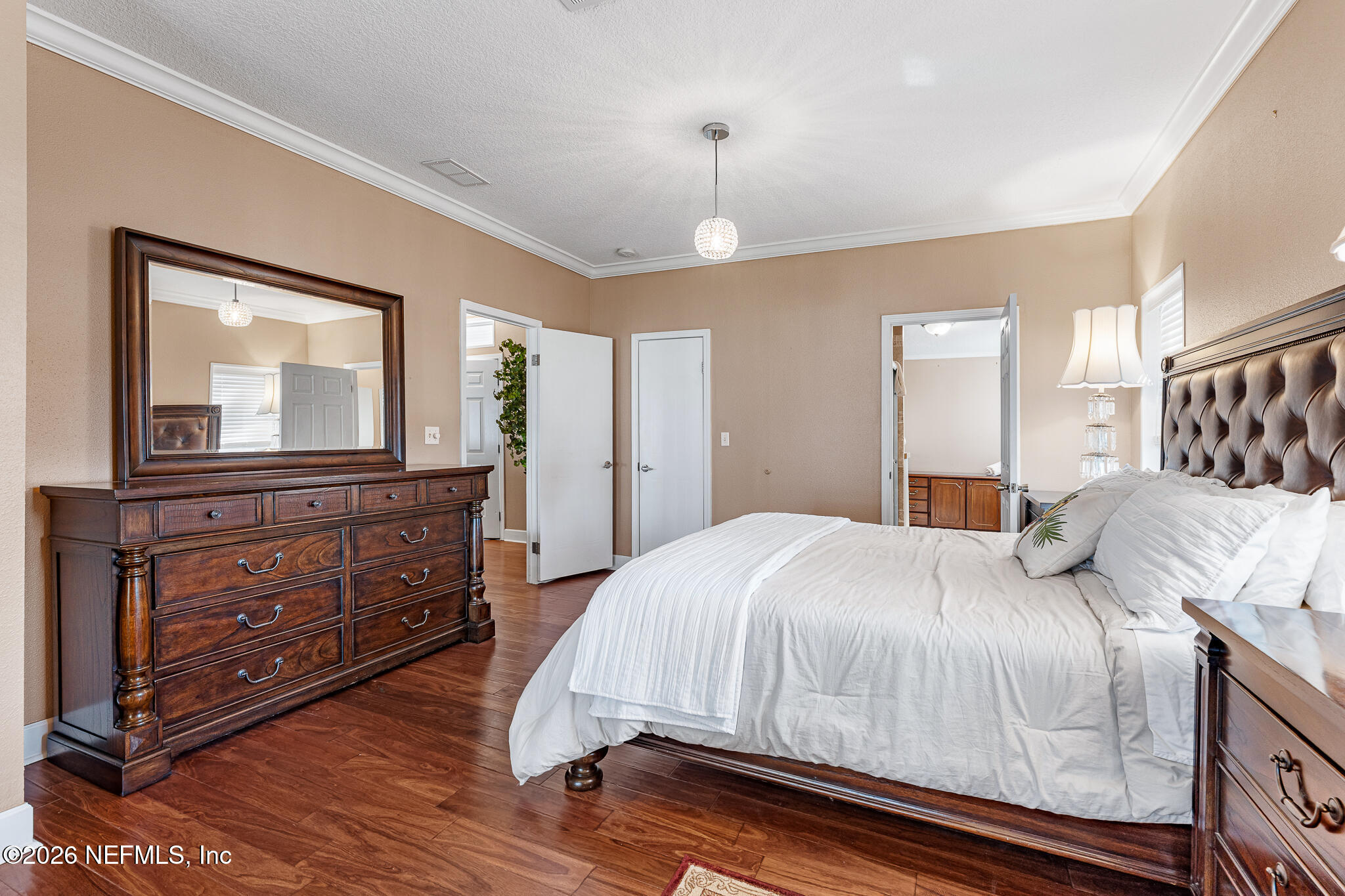 105 South Lake George Drive Georgetown, FL 32139 - Photo 16 of 30 a bedroom with a bed and a dresser