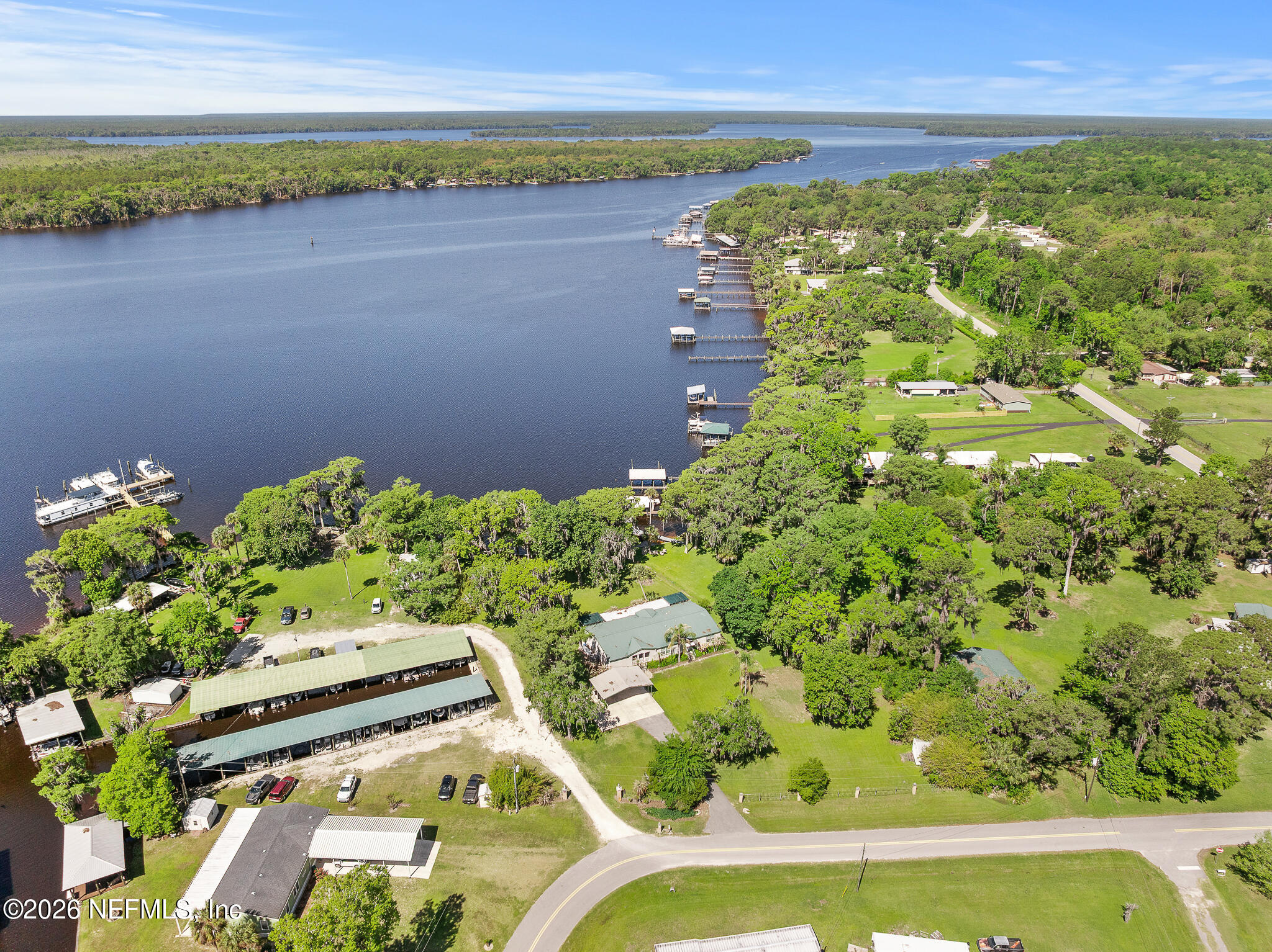 105 South Lake George Drive Georgetown, FL 32139 - Photo 26 of 30 a view of a lake with a big yard