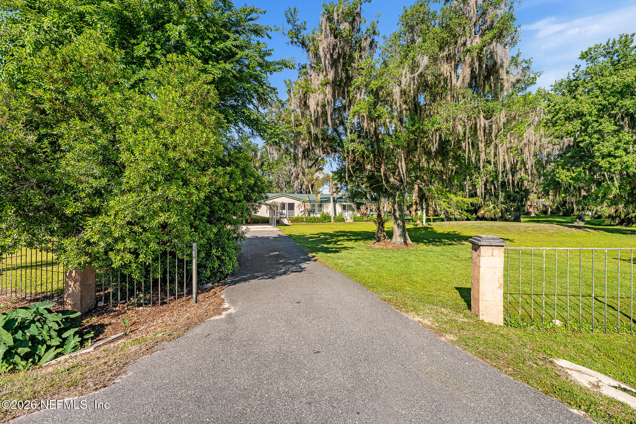 105 South Lake George Drive Georgetown, FL 32139 - Photo 5 of 30 a view of a park with large trees