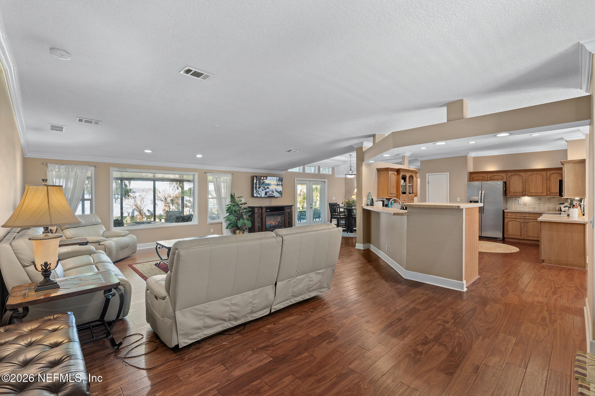 105 South Lake George Drive Georgetown, FL 32139 - Photo 10 of 30 a living room with furniture and a wooden floor