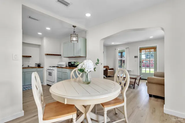 a view of a dining room with furniture