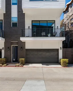 a front view of a house with garage