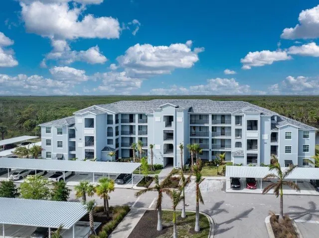a view of a building with sitting area