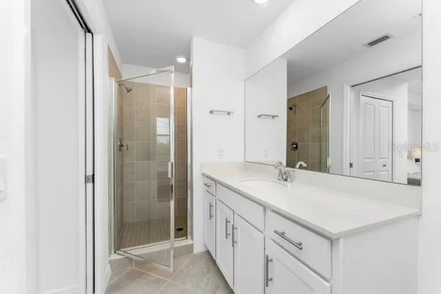 a bathroom with a sink toilet and vanity