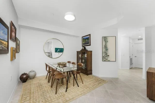 a view of a livingroom with furniture and wooden floor