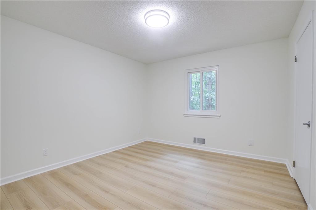 765 Spring Valley Drive Cumming, GA 30041 - Photo 21 of 31 wooden floor in a room