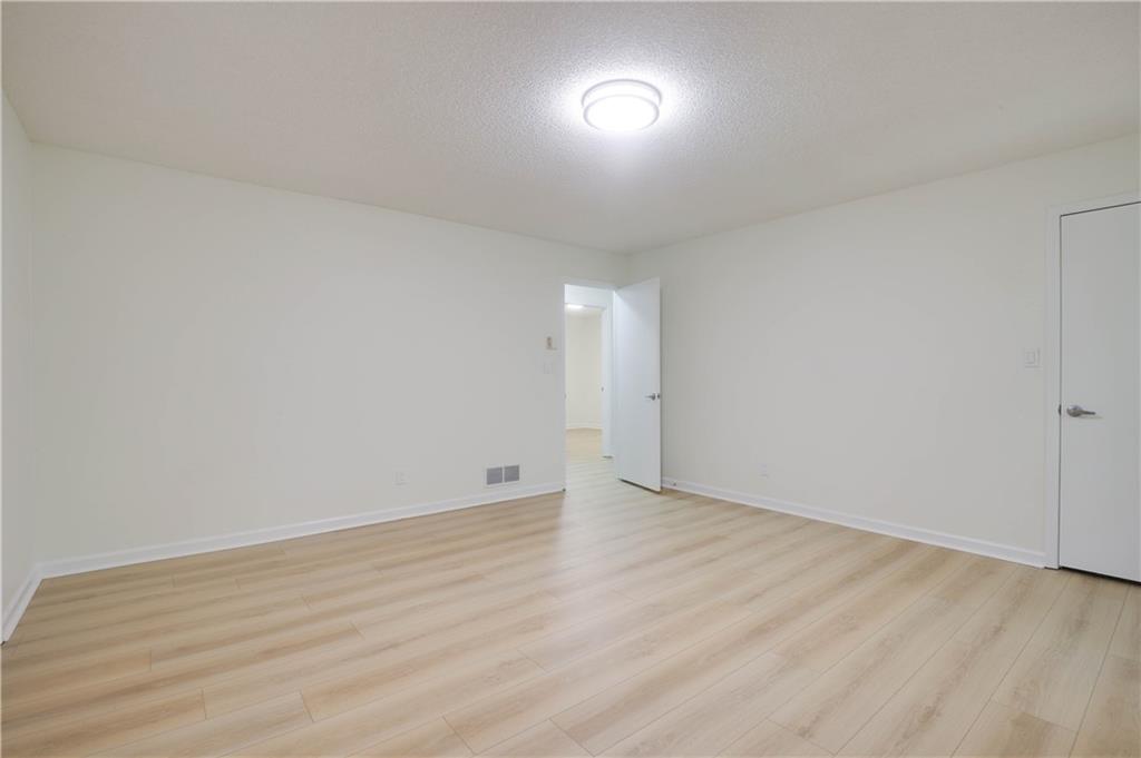 765 Spring Valley Drive Cumming, GA 30041 - Photo 24 of 31 a view of an empty room