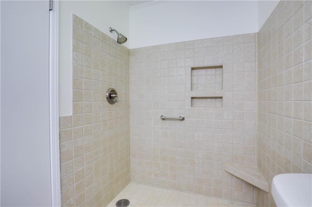 765 Spring Valley Drive Cumming, GA 30041 - Photo 26 of 31 a bathroom with a shower