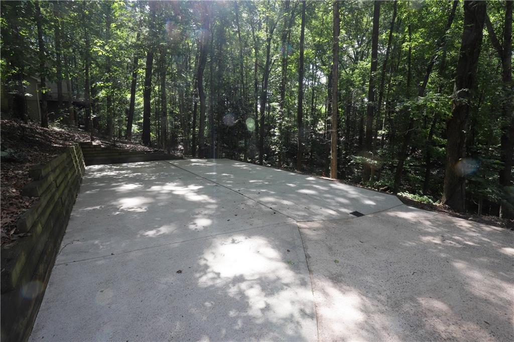 765 Spring Valley Drive Cumming, GA 30041 - Photo 28 of 31 a view of backyard with green space