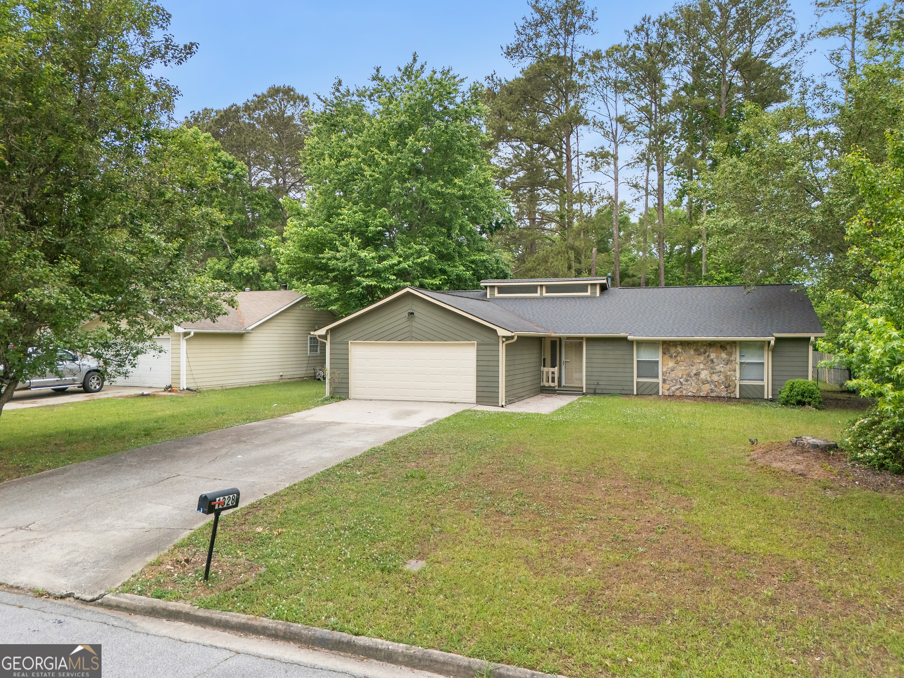 1328 Foxvale Drive Hampton, GA 30228 - Photo 2 of 27 front view of a house with a yard