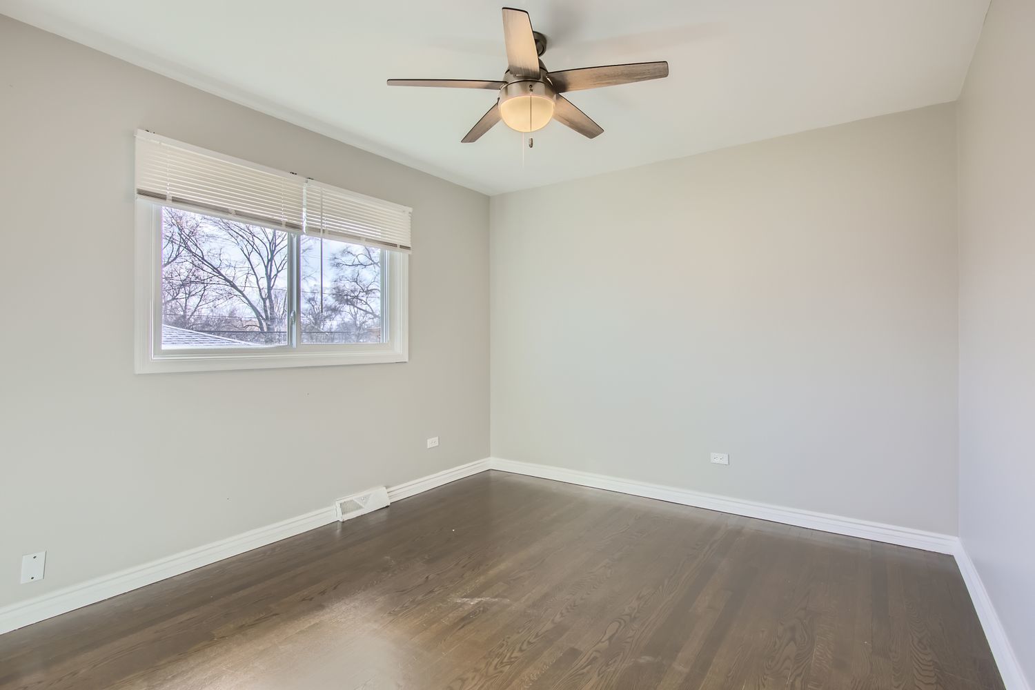 10403 Barnard Drive Chicago Ridge, IL 60415 - Photo 13 of 25 an empty room with a window and a fan