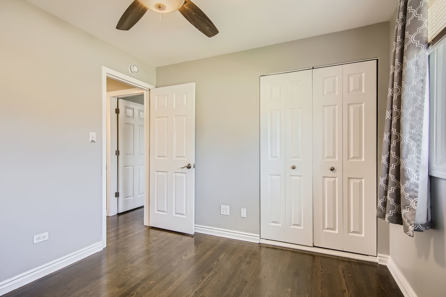 10403 Barnard Drive Chicago Ridge, IL 60415 - Photo 16 of 25 an empty room with wooden floor closet and windows