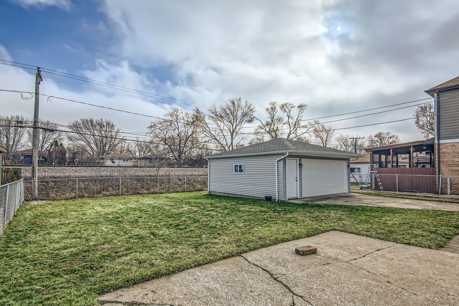 10403 Barnard Drive Chicago Ridge, IL 60415 - Photo 23 of 25 a view of a house with a yard