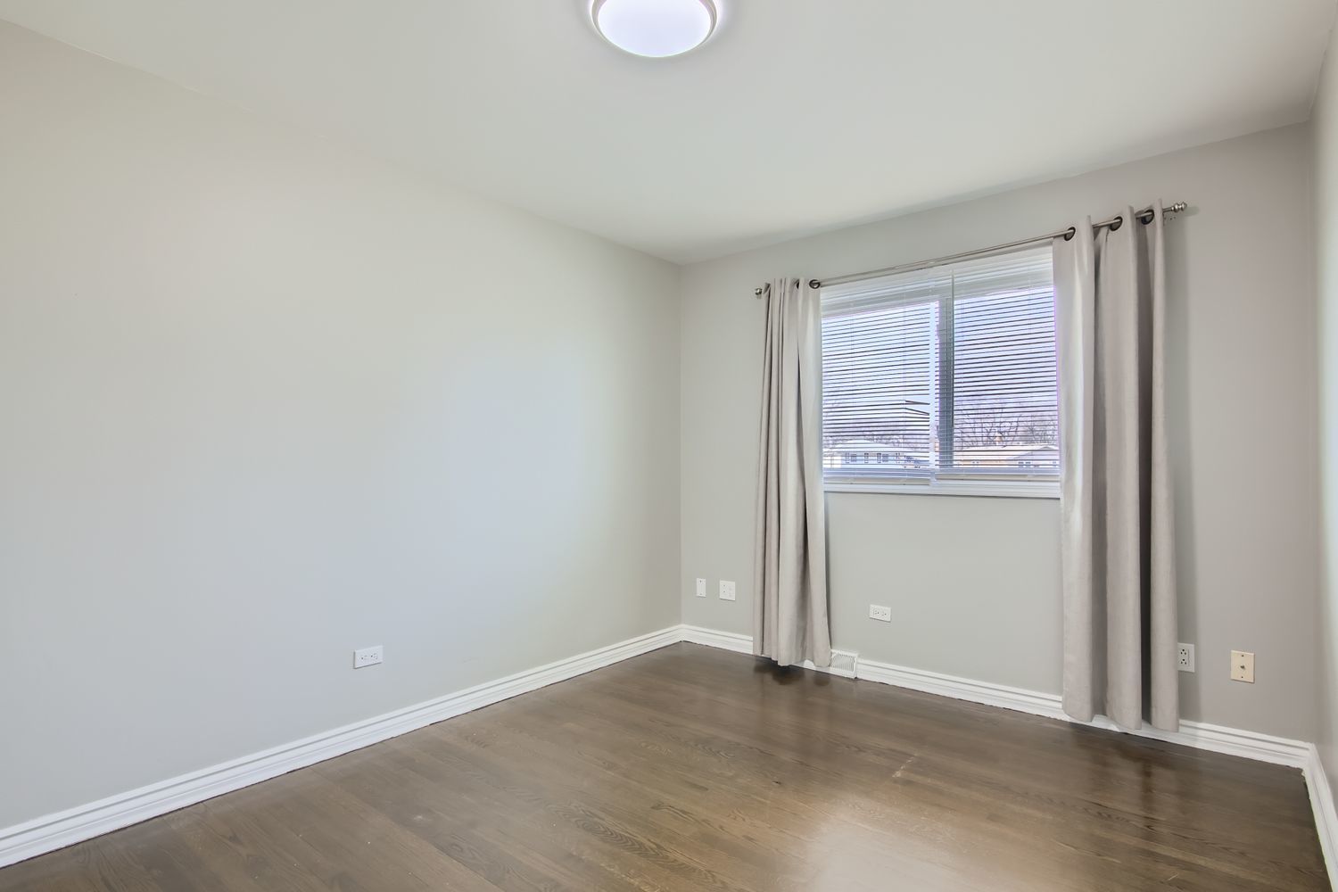 10403 Barnard Drive Chicago Ridge, IL 60415 - Photo 10 of 25 an empty room with wooden floor and windows
