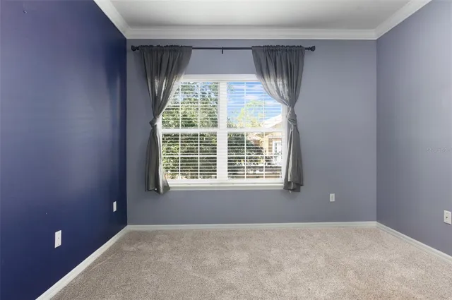 a bathroom with a granite countertop bathtub sink vanity and mirror