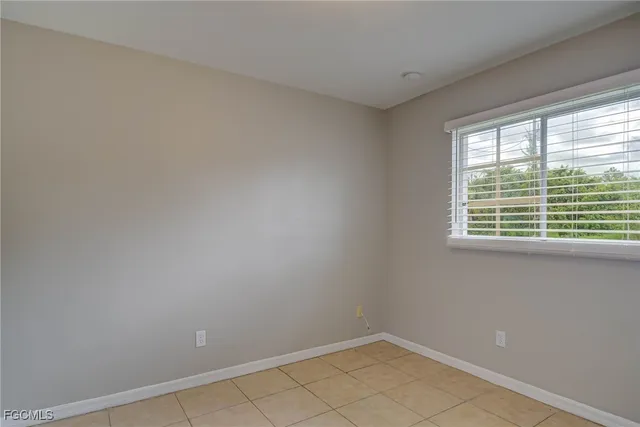 a view of a room that has a window