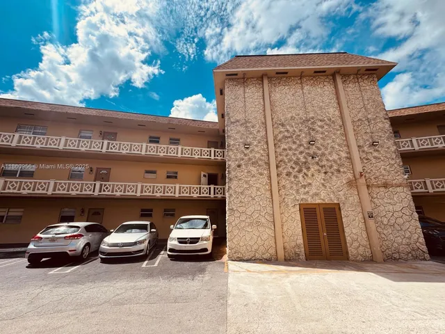 a car parked in front of a building