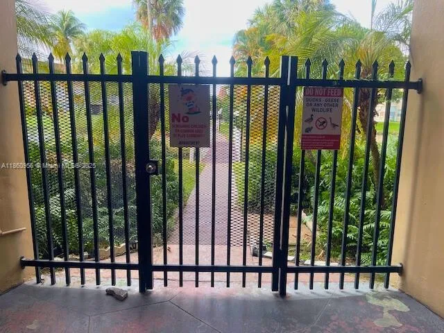 a view of a street with a building in the background