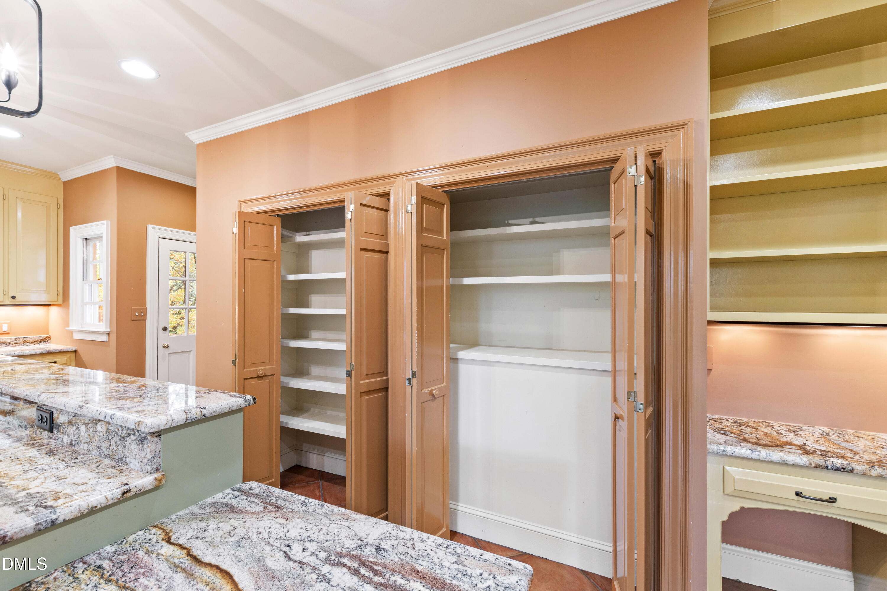 3324 Landor Road Raleigh, NC 27609 - Photo 17 of 69 a bedroom with a bed and a view of living room