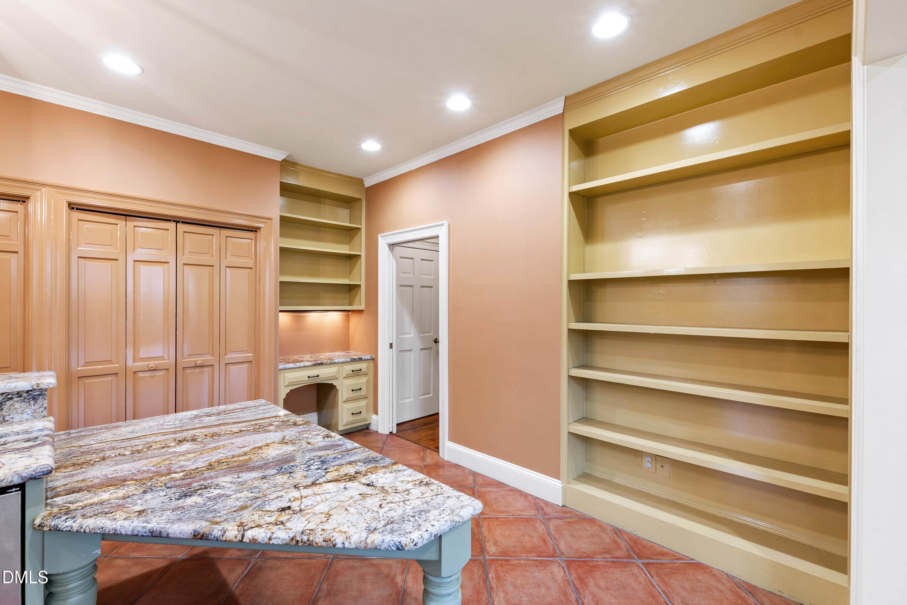 3324 Landor Road Raleigh, NC 27609 - Photo 18 of 69 a bedroom with a bed and a flat tv screen