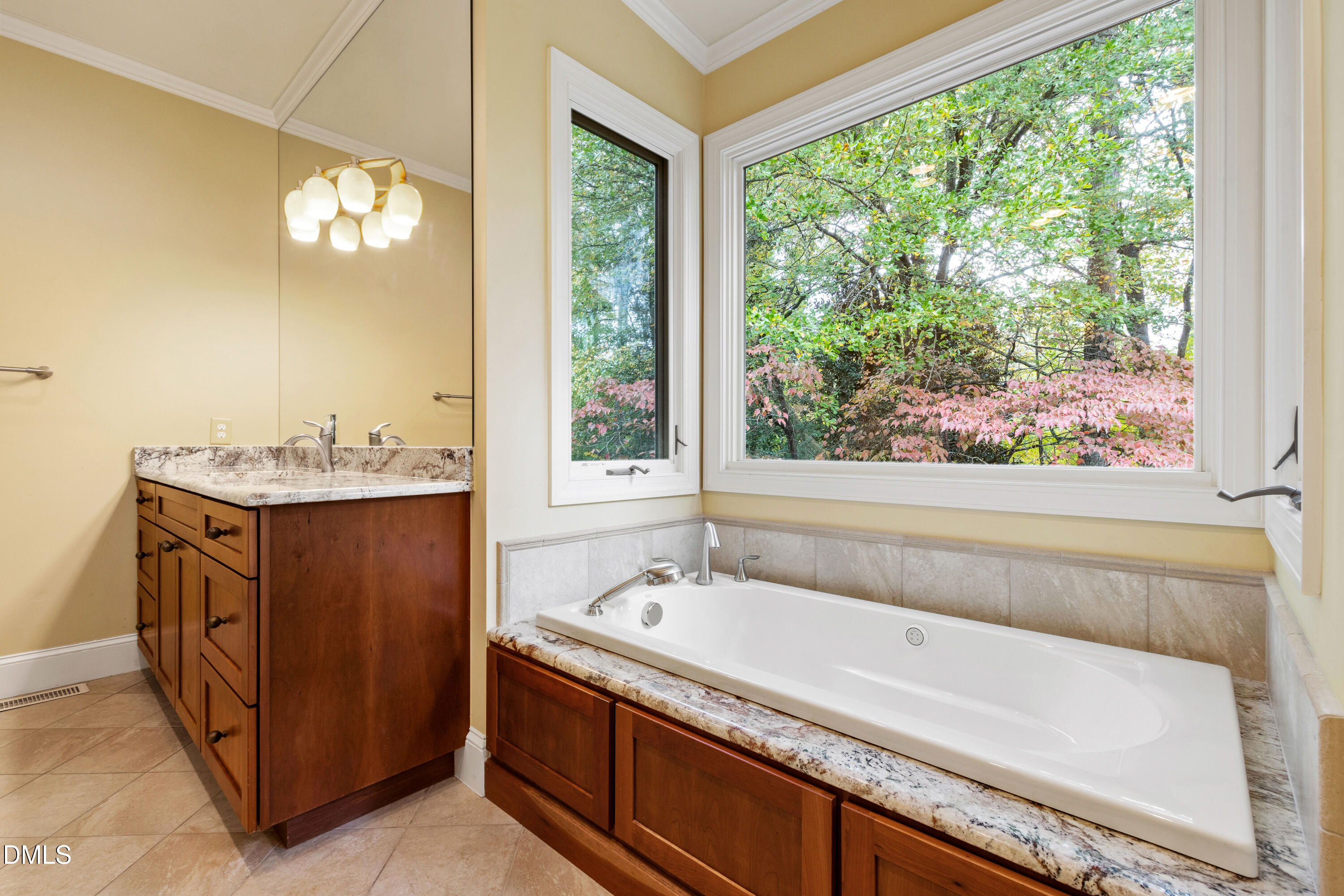 3324 Landor Road Raleigh, NC 27609 - Photo 34 of 69 a bathroom with a bathtub and sink