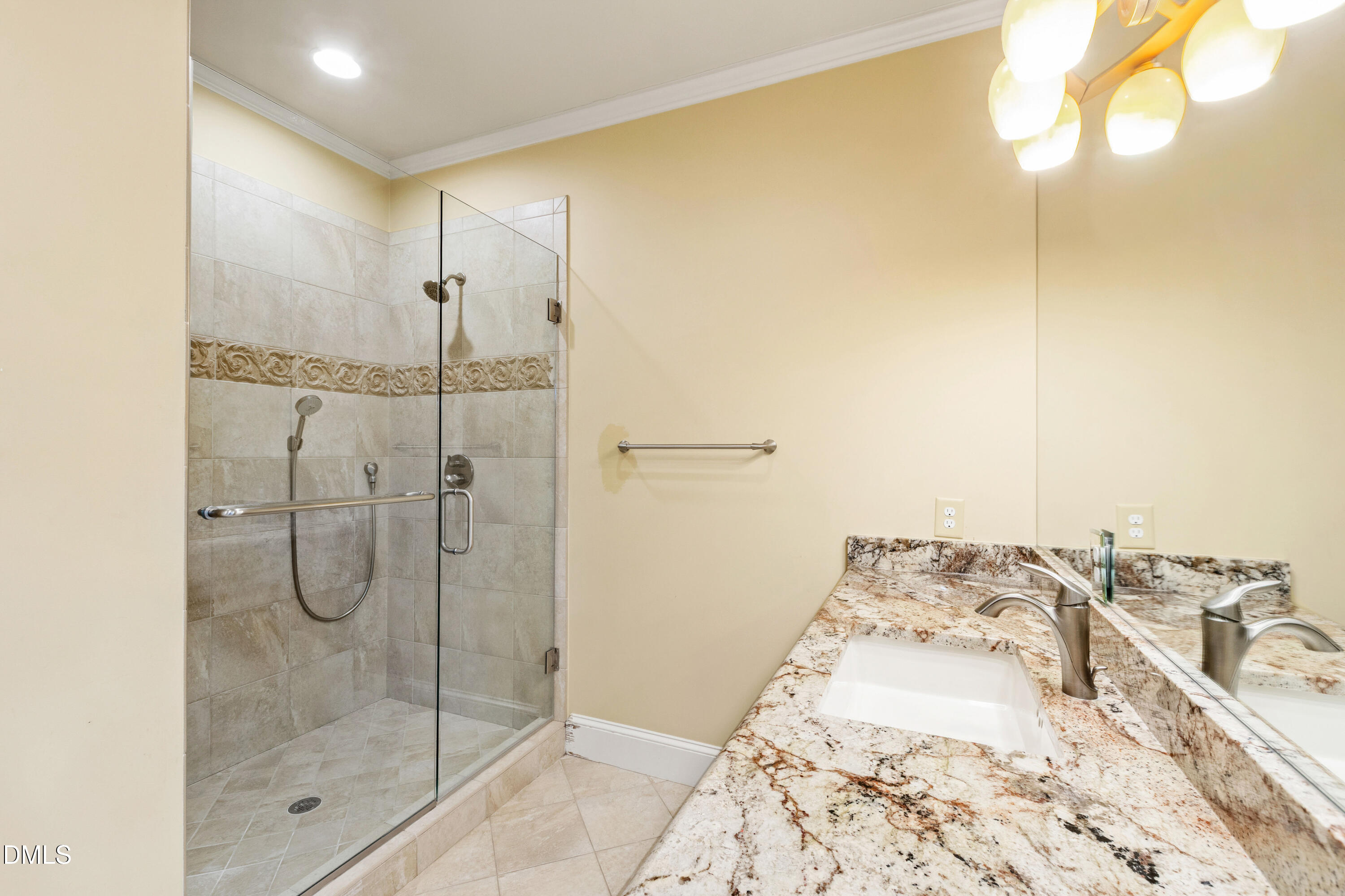 3324 Landor Road Raleigh, NC 27609 - Photo 35 of 69 a bathroom with a shower and a sink