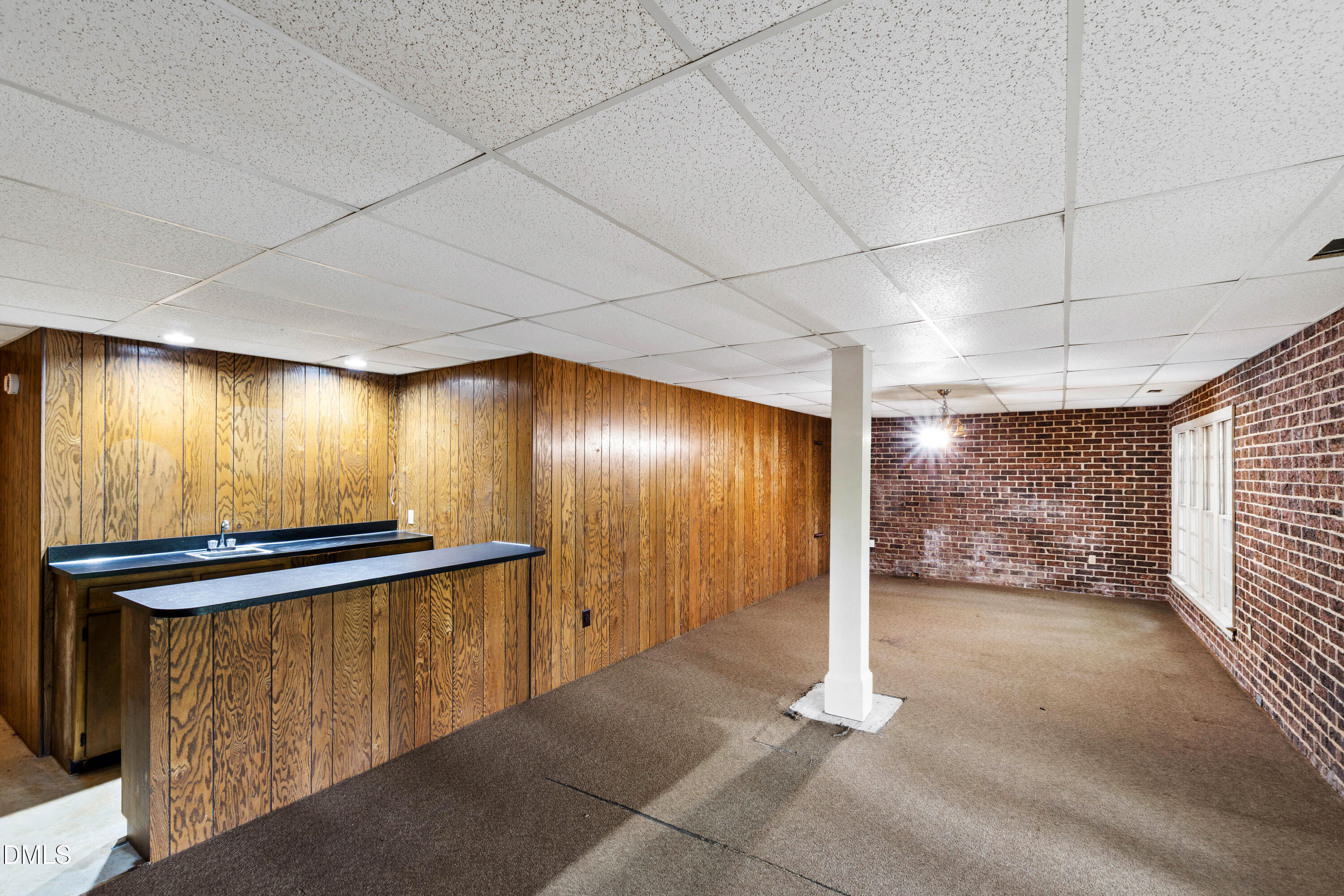 3324 Landor Road Raleigh, NC 27609 - Photo 55 of 69 a view of a hallway with paintings