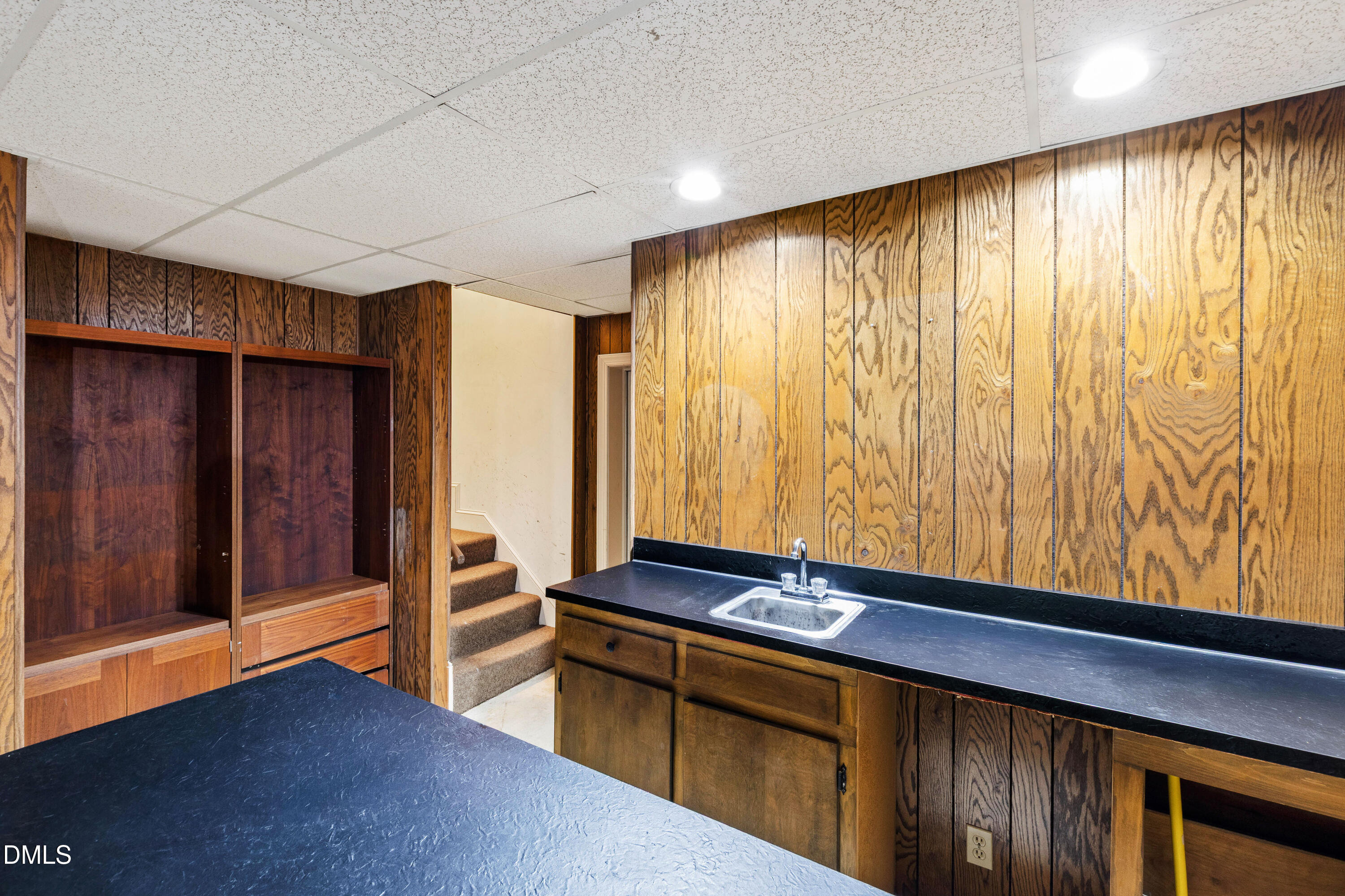 3324 Landor Road Raleigh, NC 27609 - Photo 56 of 69 a view of room with a large window and wooden floor