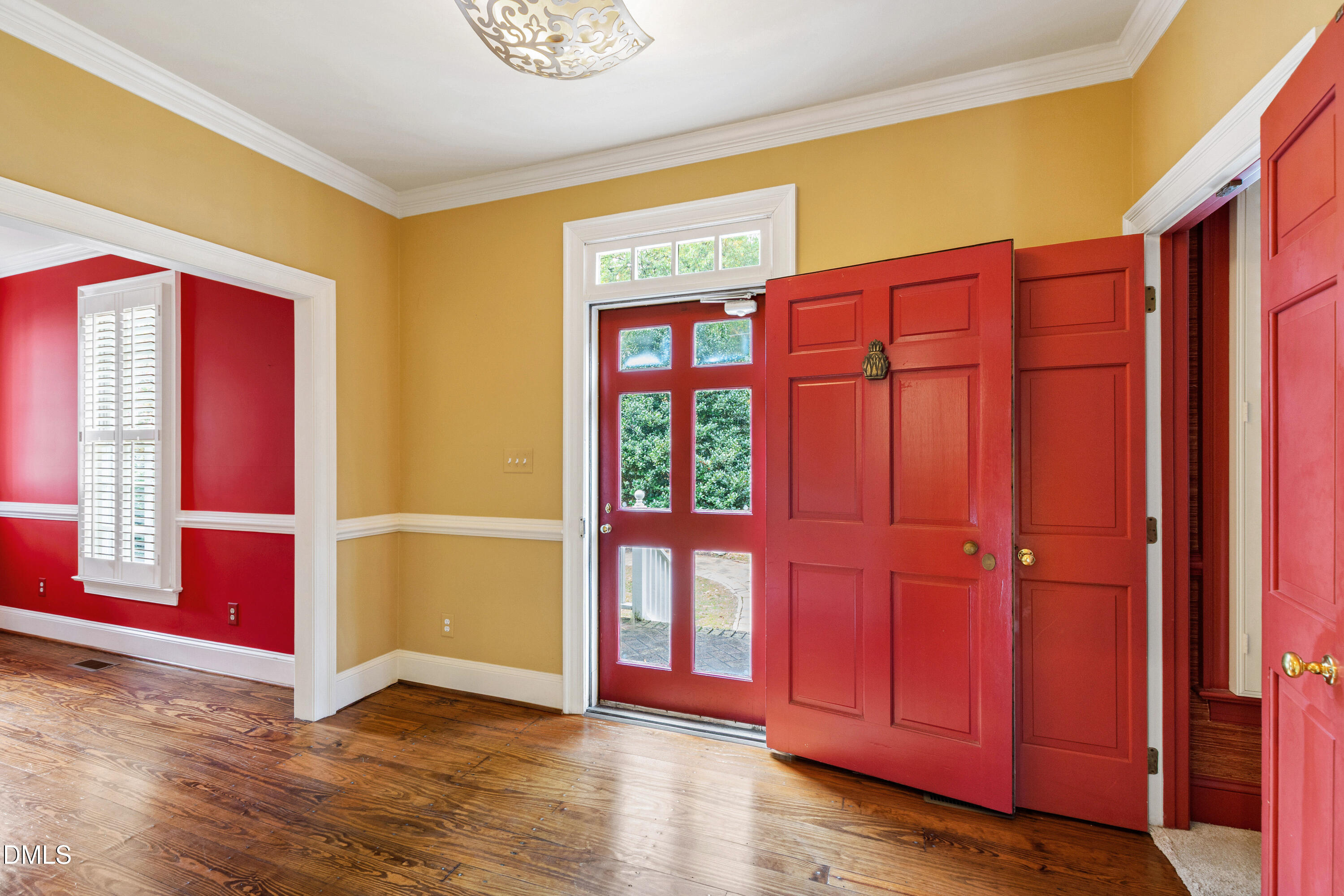 3324 Landor Road Raleigh, NC 27609 - Photo 5 of 69 a view of front door with wooden floor
