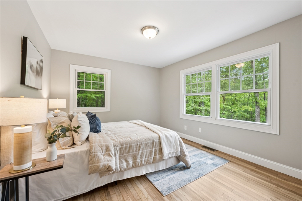 37 Hillside Road Boxford, MA 01921 - Photo 14 of 27 a bedroom with a bed wooden floor and window