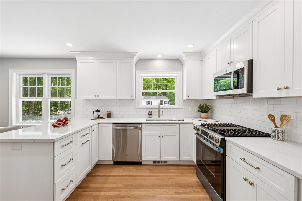 37 Hillside Road Boxford, MA 01921 - Photo 3 of 27 a kitchen that has a sink and a stove in it