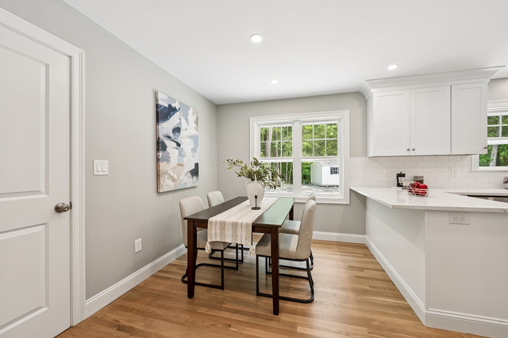 37 Hillside Road Boxford, MA 01921 - Photo 9 of 27 a view of a dining room with furniture and wooden floor