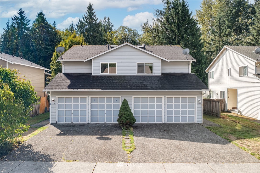 2220 164th Place Southeast Bothell, WA 98012 - Photo 3 of 33 a view of front of house with garage