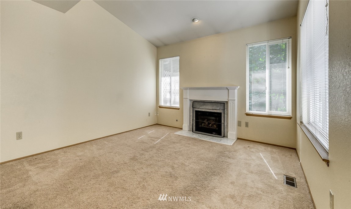 2220 164th Place Southeast Bothell, WA 98012 - Photo 22 of 33 a view of an empty room with a window