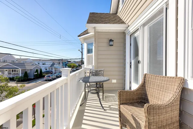 a view of balcony with furniture