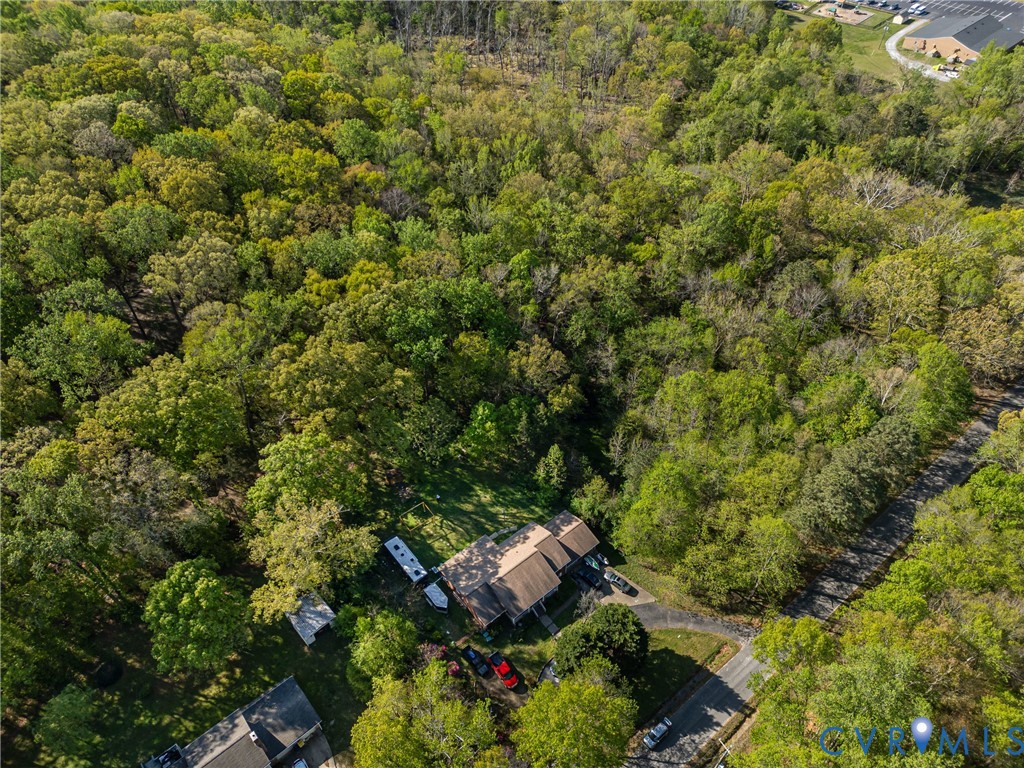 14219 Spruce Avenue Chester, VA 23836 - Photo 5 of 32 an aerial view of residential house with outdoor space and trees all around