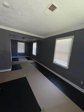 a hallway with windows
