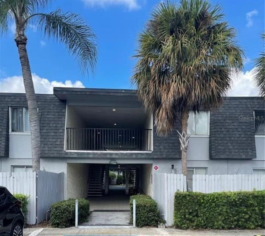 1928 South Conway Road, Unit 17 Orlando, FL 32812 - Photo 1 of 13 a front view of house with yard and green space