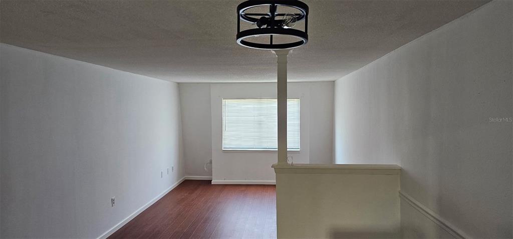 1928 South Conway Road, Unit 17 Orlando, FL 32812 - Photo 4 of 13 a view of an empty room with a window