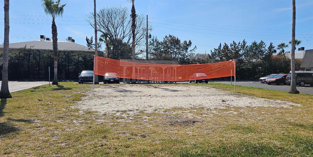 1928 South Conway Road, Unit 17 Orlando, FL 32812 - Photo 9 of 13 a view of a yard with a bench