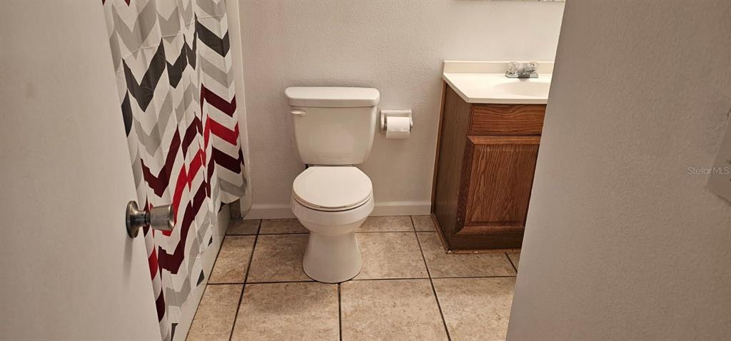 1928 South Conway Road, Unit 17 Orlando, FL 32812 - Photo 10 of 13 a bathroom with a toilet and a sink