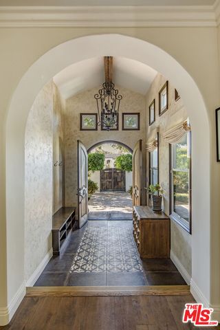 a view of entryway with a front door